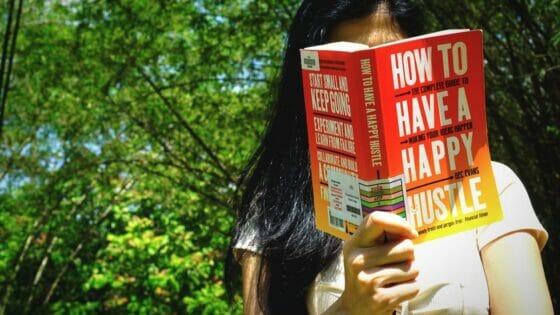 Front cover of How to have a happy hustle by bec evans book review