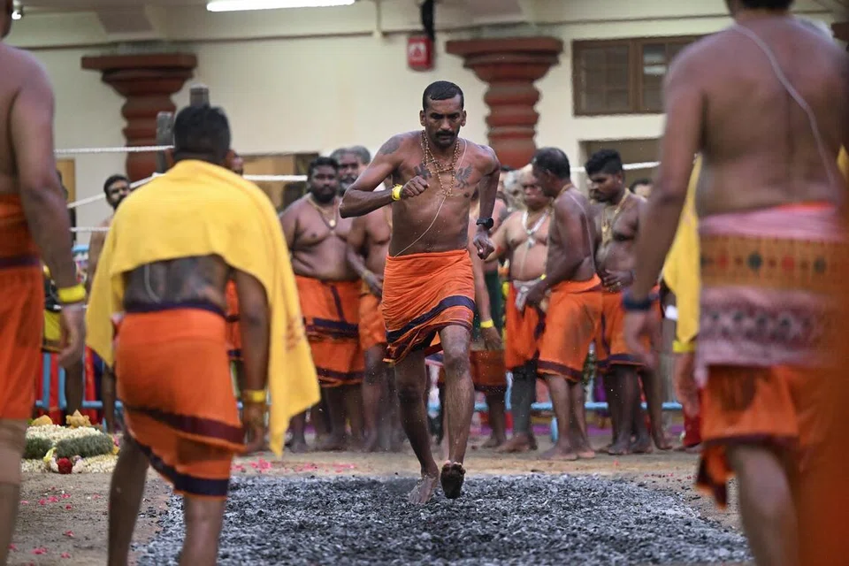 Thousands-Of-Devotees-Brave-Embers-At-Fire-Walking-Festival-In-Singapore